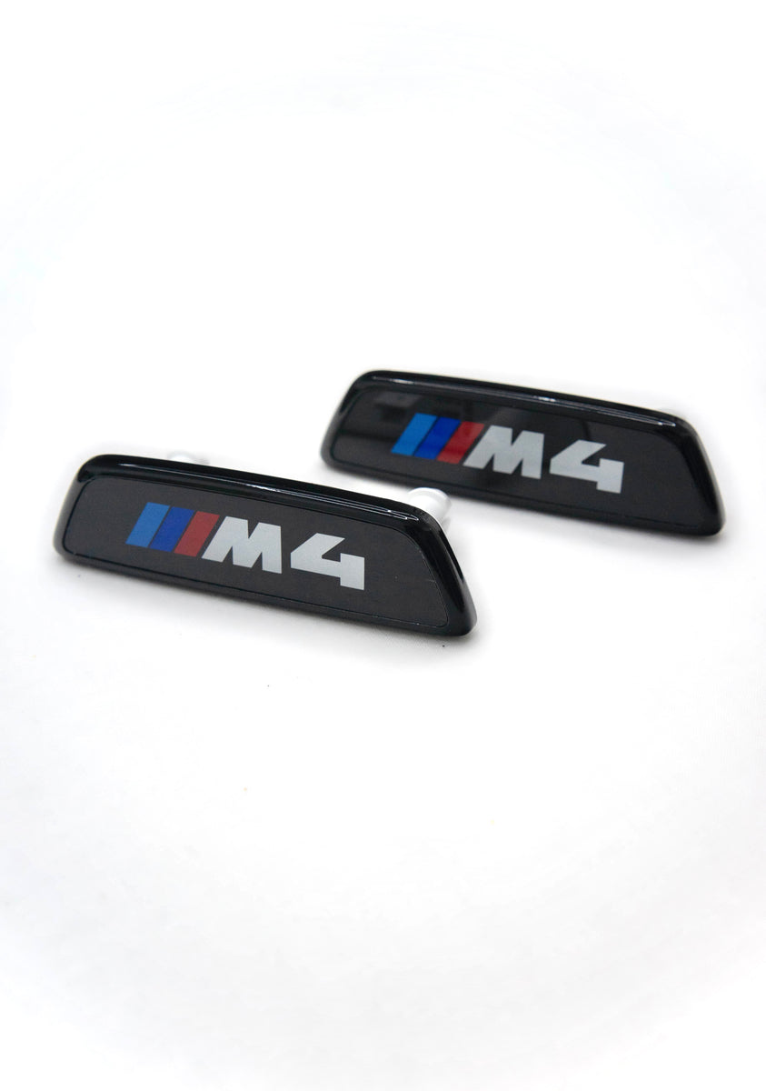 BMW PAINTED G8X ILLUMINATED SEAT BADGES