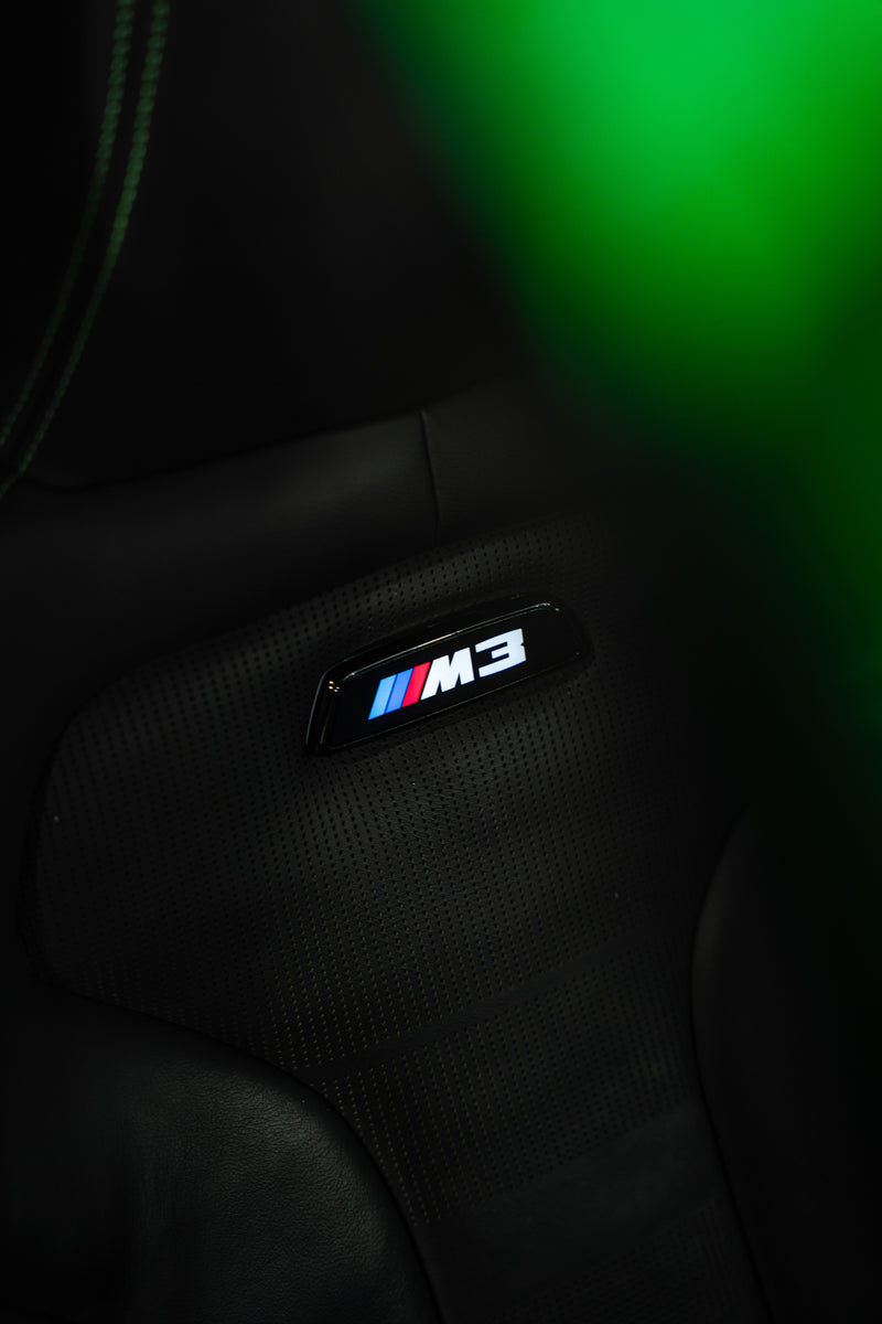 BMW PAINTED G8X ILLUMINATED SEAT BADGES